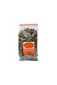 Herbal Pets Chrupiąca Łączka 70g zioła dla królików i gryzoni, opakowanie na tle suszonej trawy i siana, konikpolny.pl