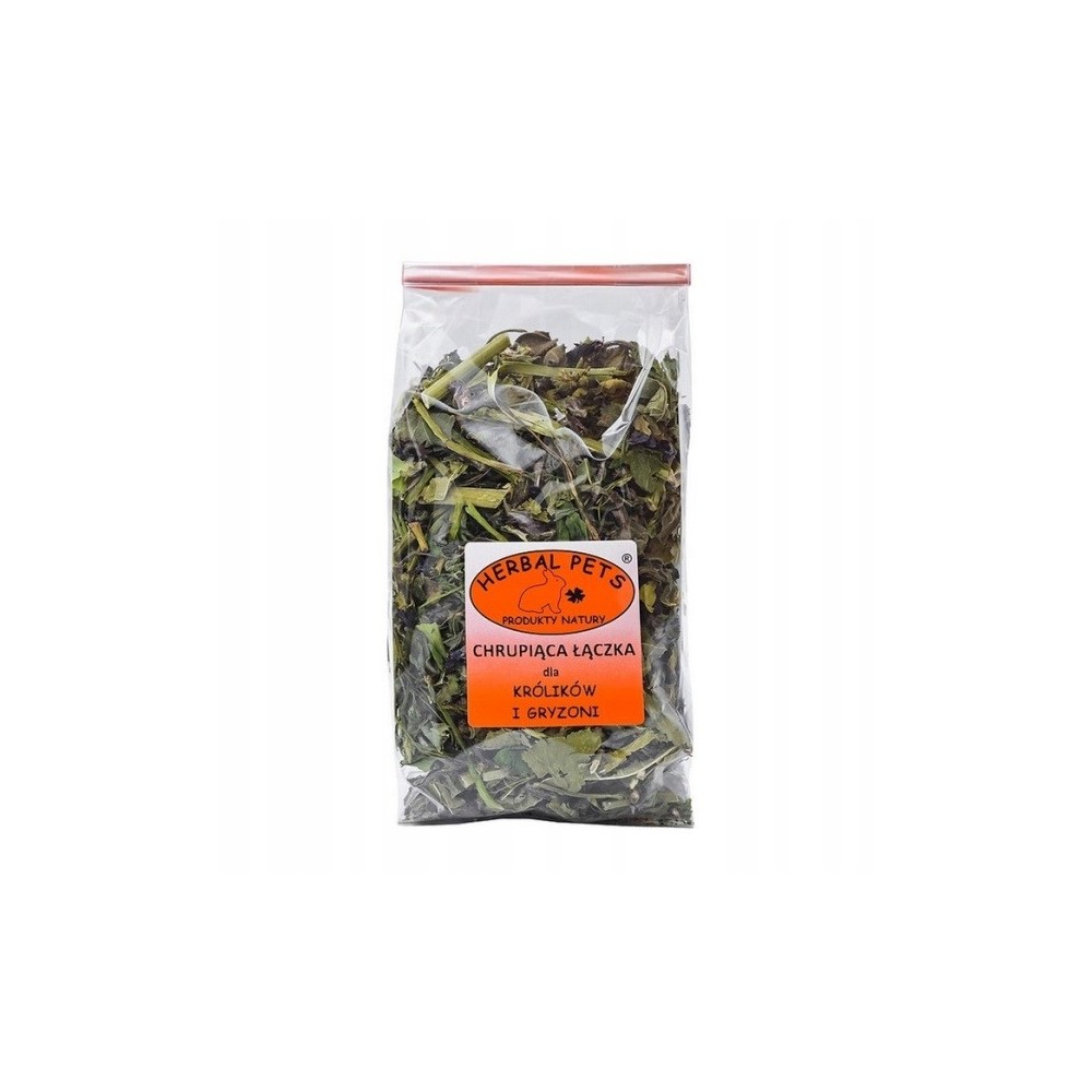 Herbal Pets Chrupiąca Łączka 70g zioła dla królików i gryzoni, opakowanie na tle suszonej trawy i siana, konikpolny.pl