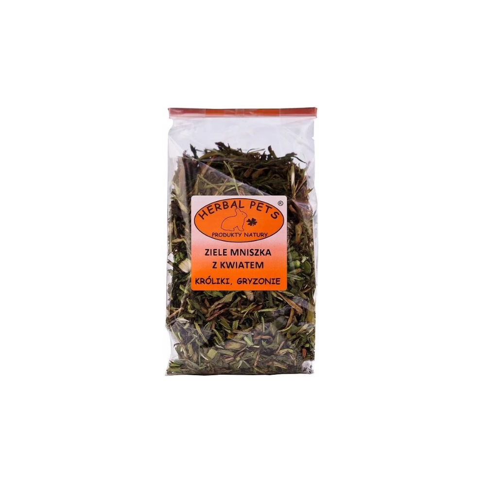 Herbal Pets Ziele Mniszka z Kwiatem 80g w opakowaniu, na tle kwitnącego mniszka lekarskiego i siana, konikpolny.pl